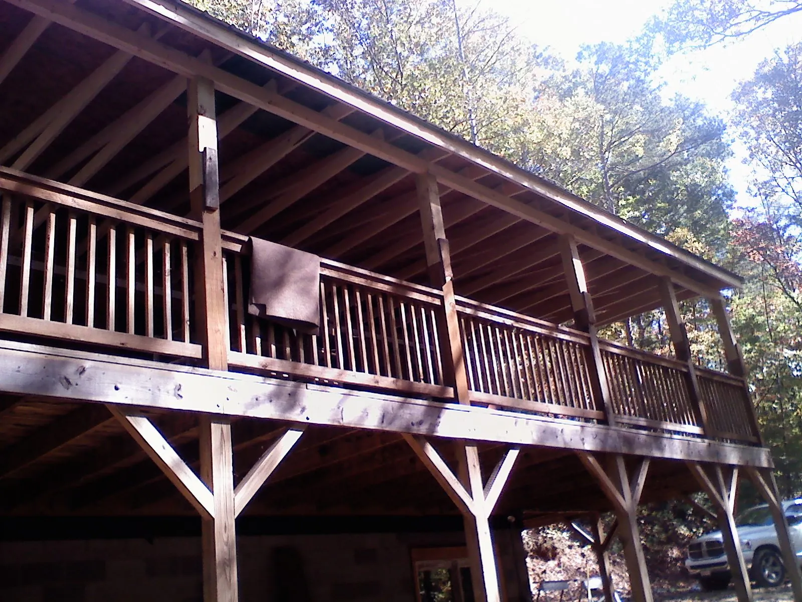 Timber framing under a new elevated porch and deck — Roof Leak Repair in Conneaut by Roofing Brothers